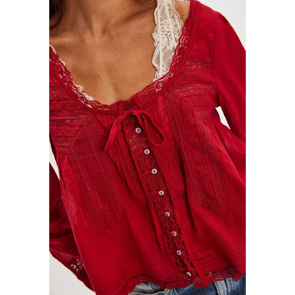 Blusa transparente con cordones