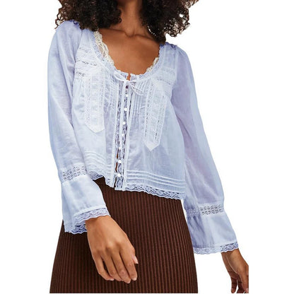 Blusa transparente con cordones