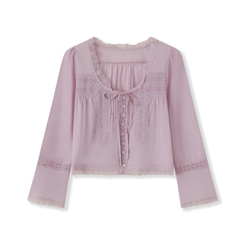 Blusa transparente con cordones