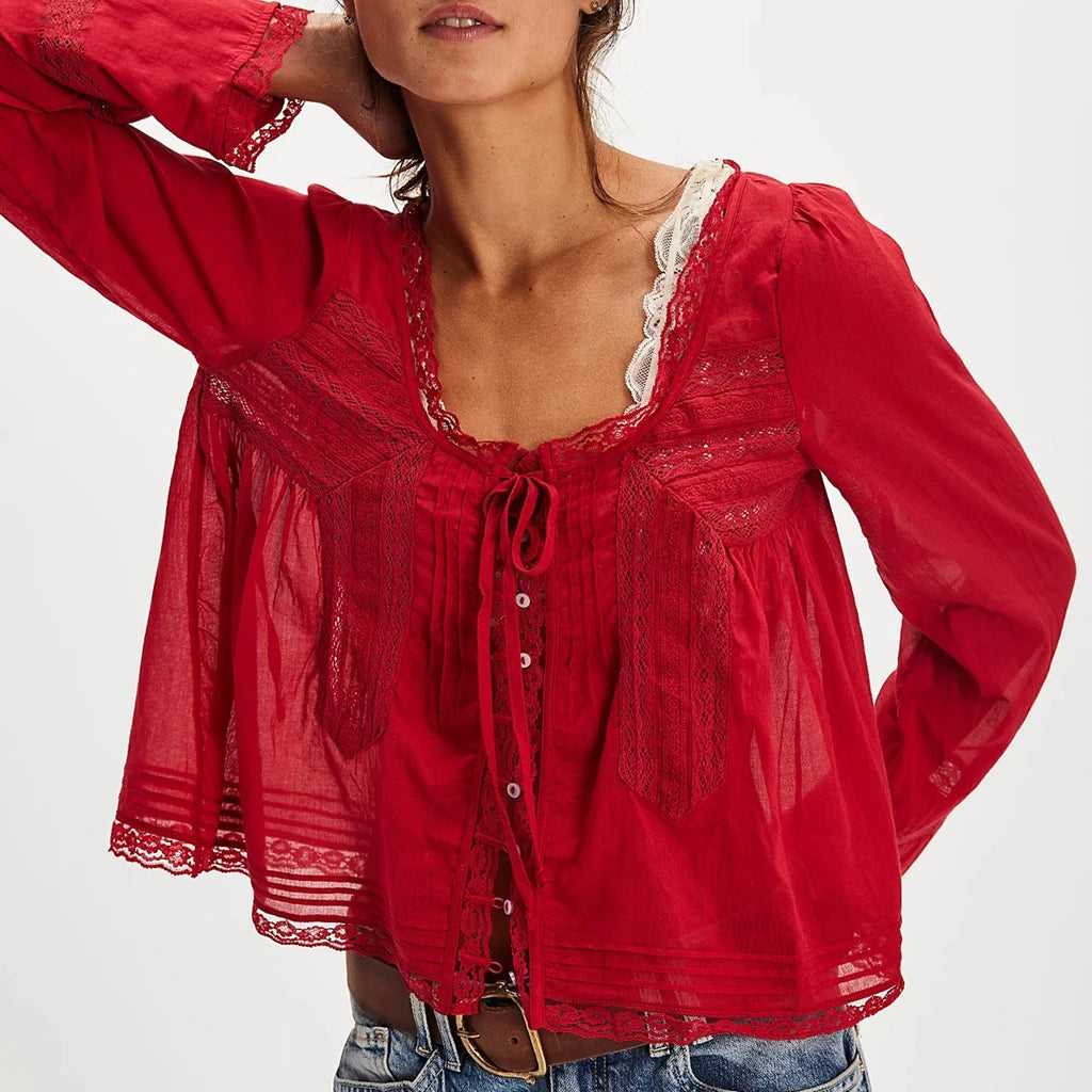 Blusa transparente con cordones