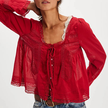 Blusa transparente con cordones