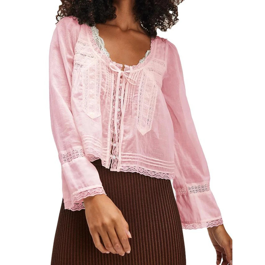 Blusa transparente con cordones