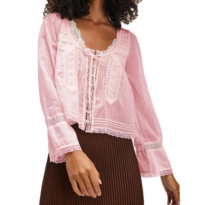 Blusa transparente con cordones